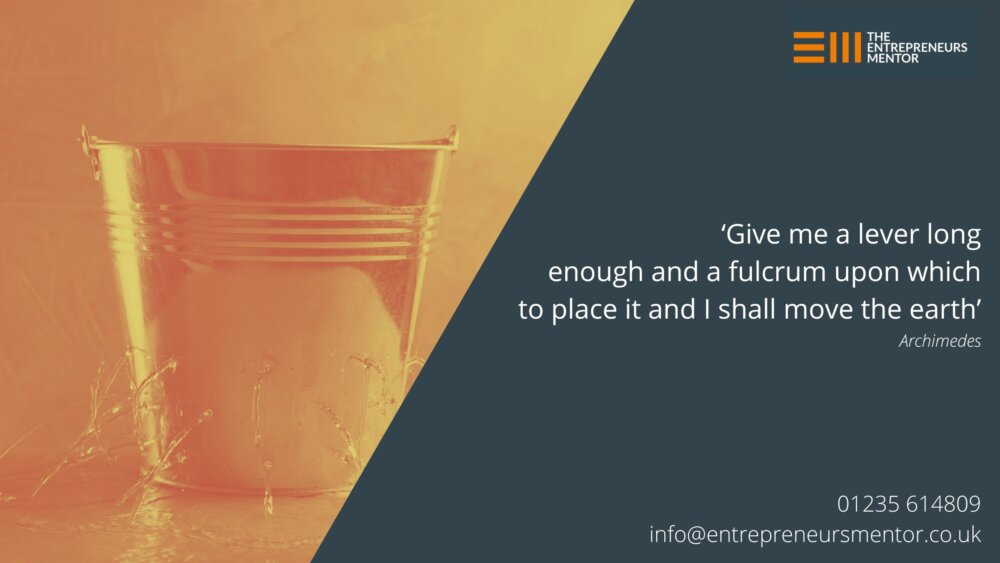 A metal bucket with holes in and water flowing out of the holes. The metaphorical leaky business bucket