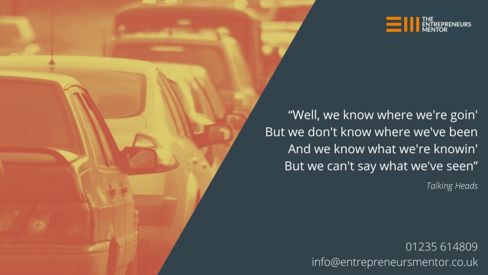 A line of cars caught in a traffic jam, signifying the journey of business