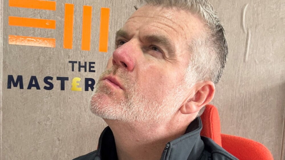 Mike Foster, the Entrepreneur's Mentor, making a 'thinking' face and looking toward the ceiling